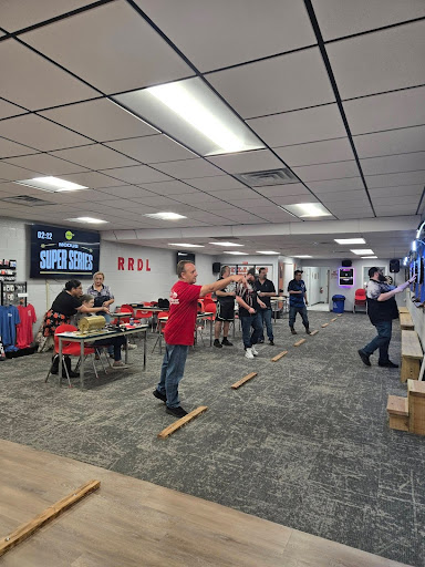 Red River Dart Leagues tournament in Burkburnett Texas with players competing in family-friendly facility